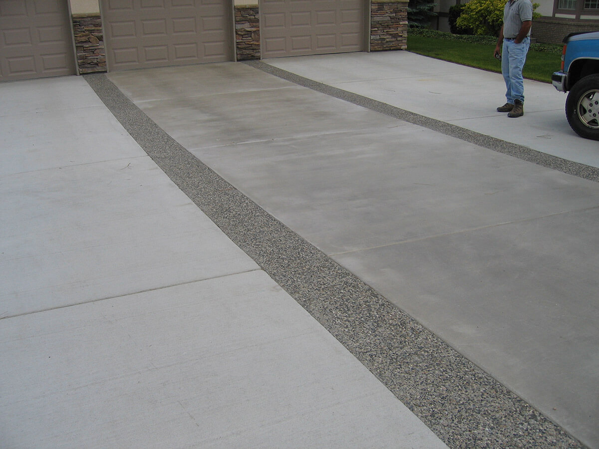 Broomed concrete with exposed aggregate borders, Kelowna