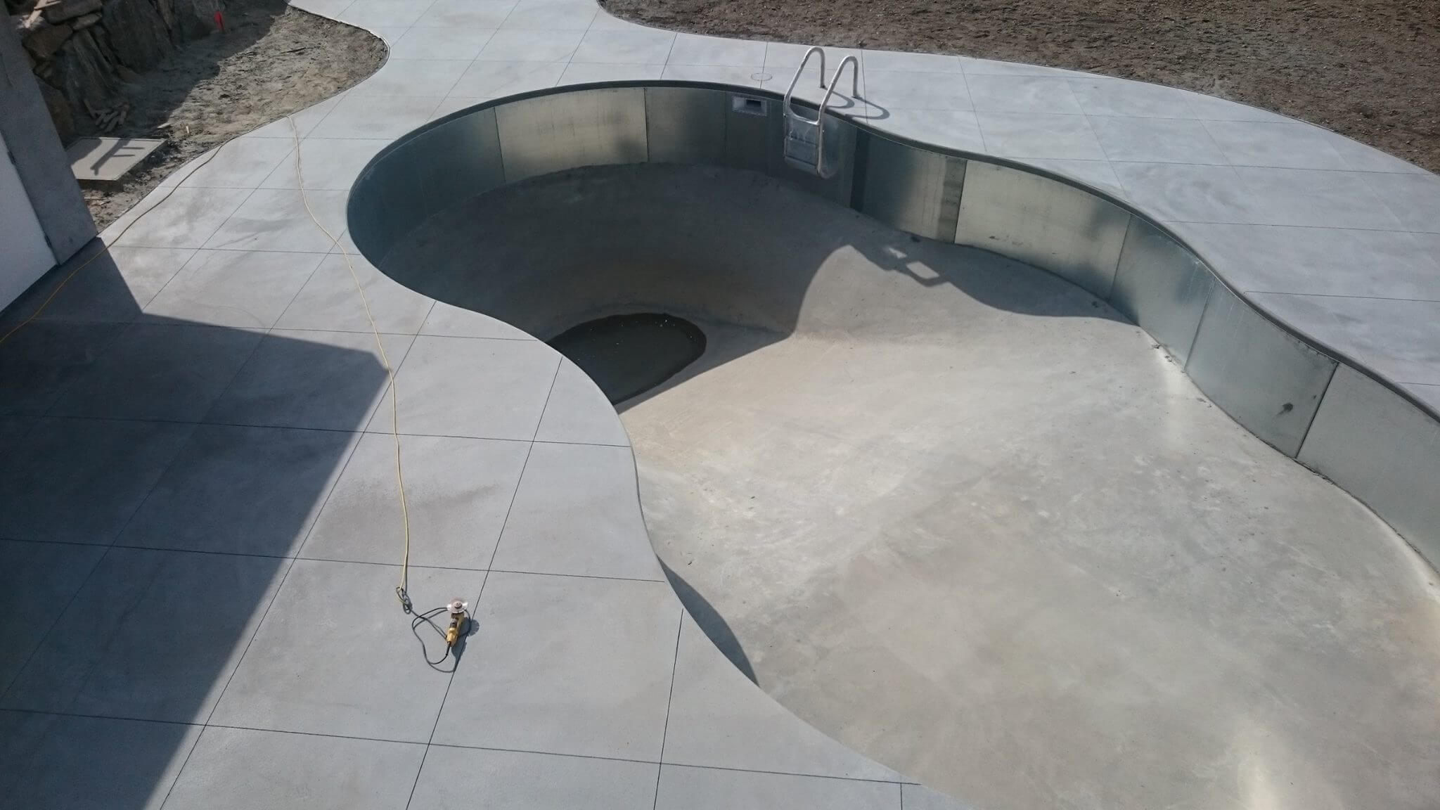 New concrete pool deck, Kelowna BC